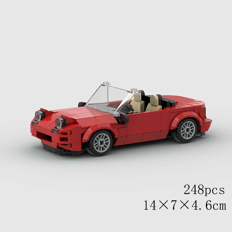 Driftbricks Mazda Miata NA red convertible brick model with pop-up headlights